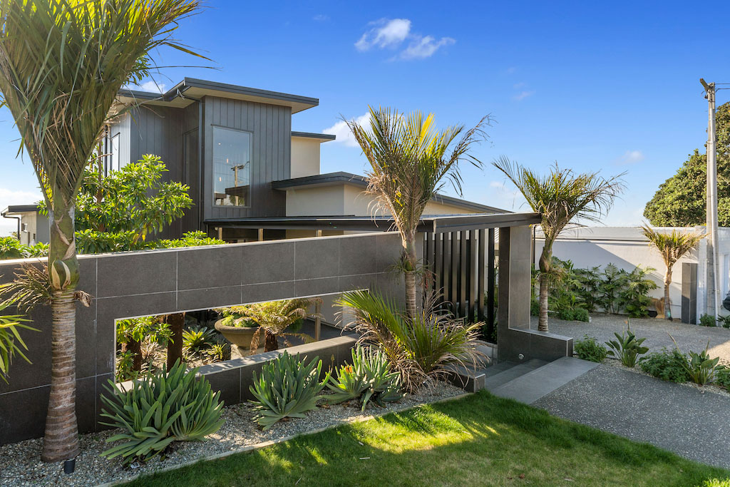 new build new plymouth new house with tropical plants